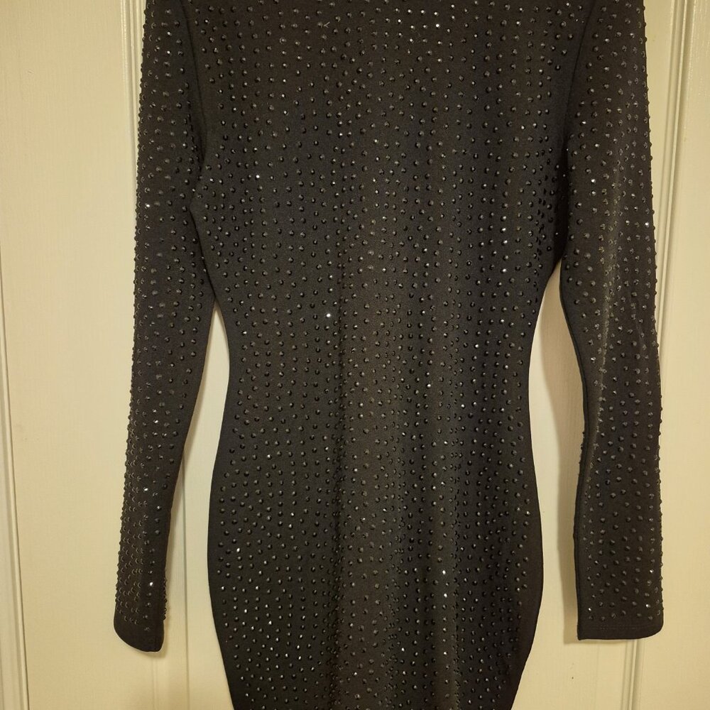 Brand new black fitted dress with black embellishment